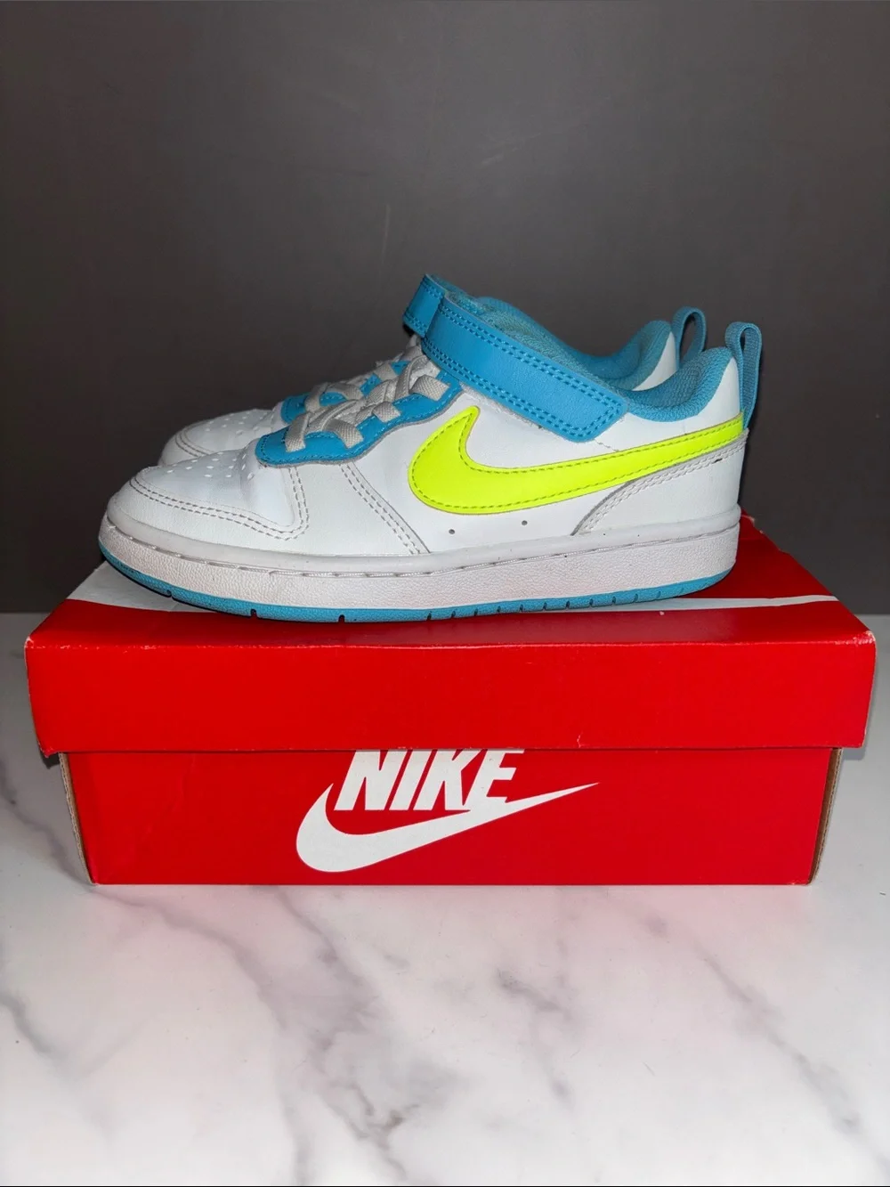 Nike Kids White Sneakers with Neon Yellow Swoosh & Light Blue Trim